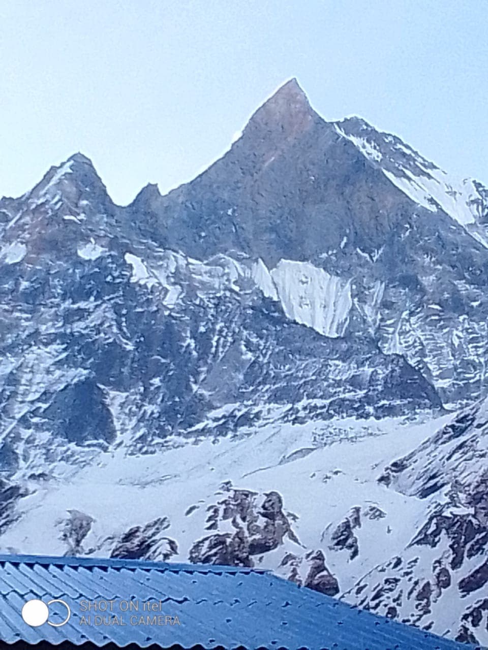 this picture shows two people, standing on the path which way to the Mardi base camp apper to be the mountainregian